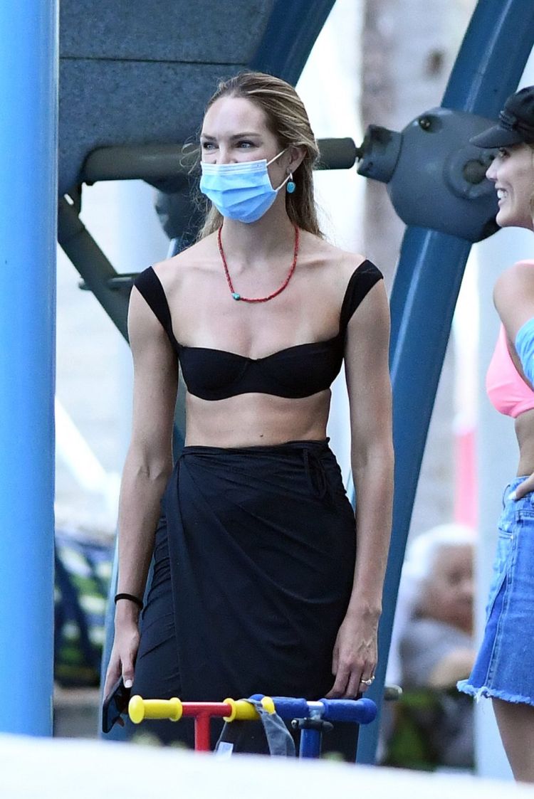 Candice Swanepoel Relaxing At A Park In Miami