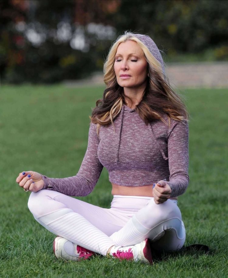 Caprice Bourret Practicing Yoga In A Park In London