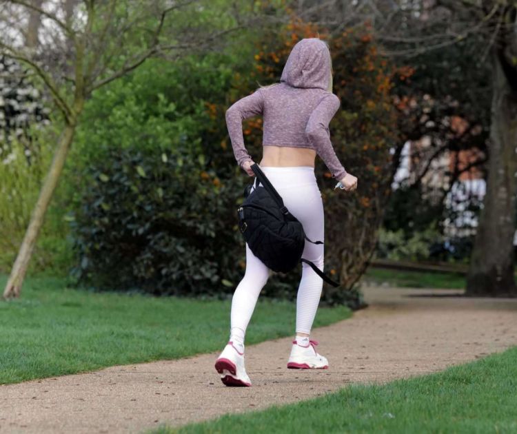 Caprice Bourret Practicing Yoga In A Park In London