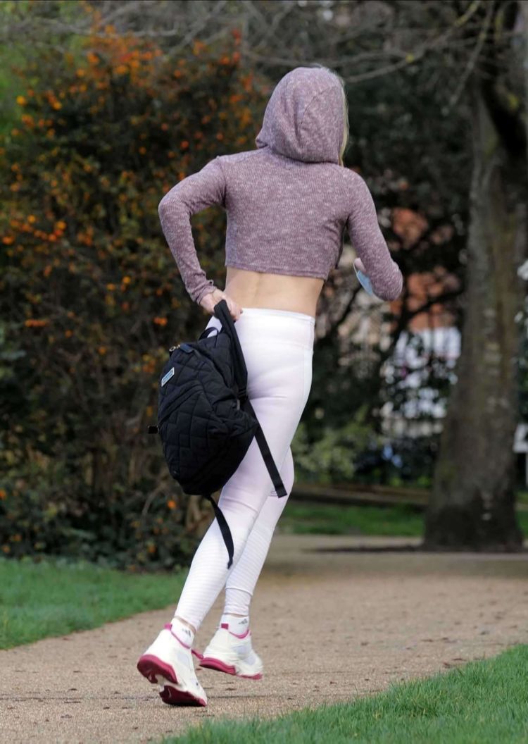 Caprice Bourret Practicing Yoga In A Park In London